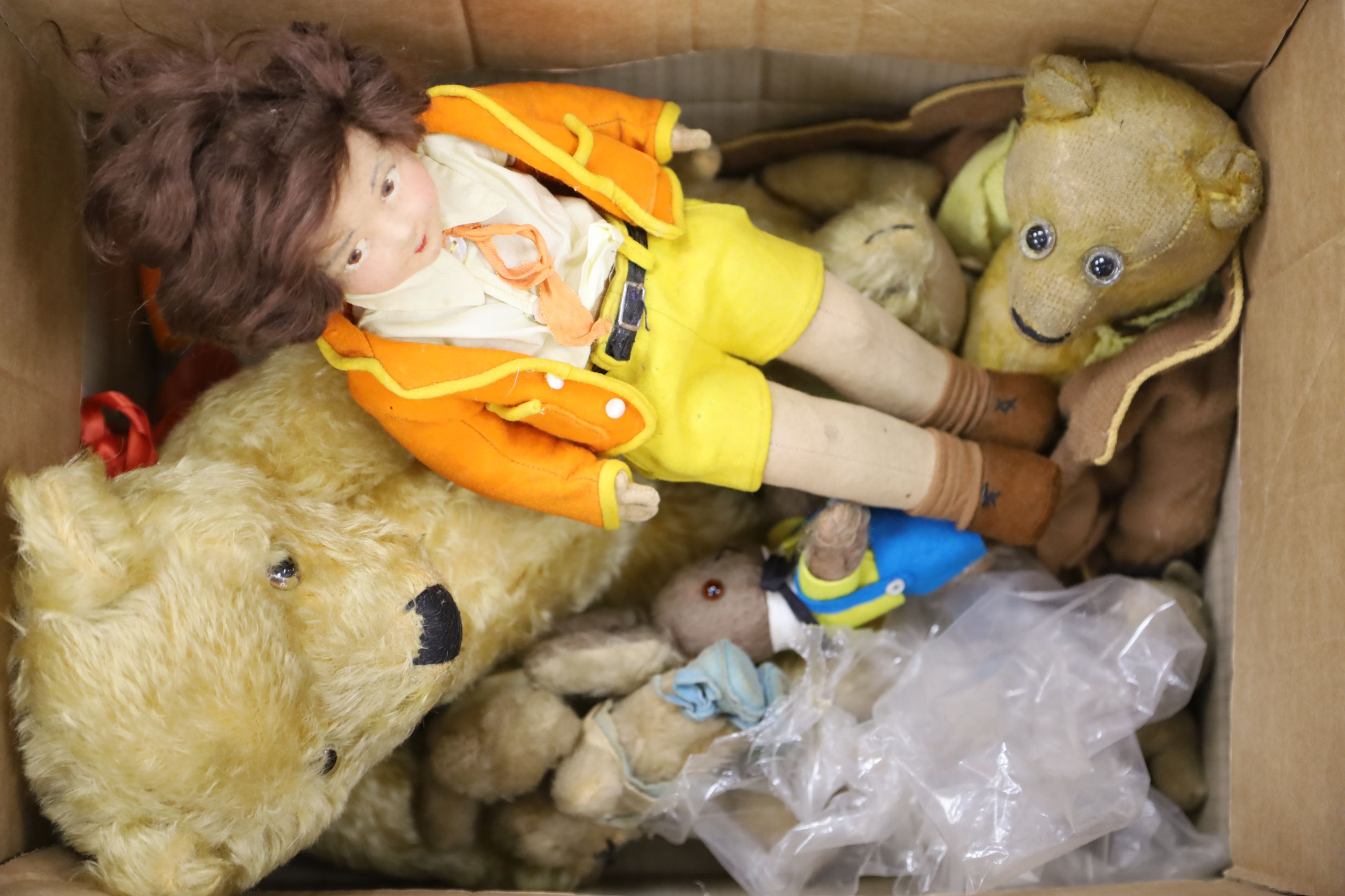 A collection of teddies and a Norah Wellings felt doll